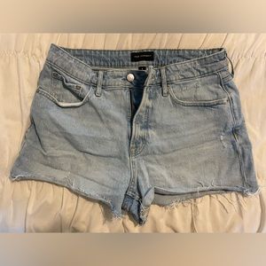 Free Assembly size 8 frayed light denim jean shorts.